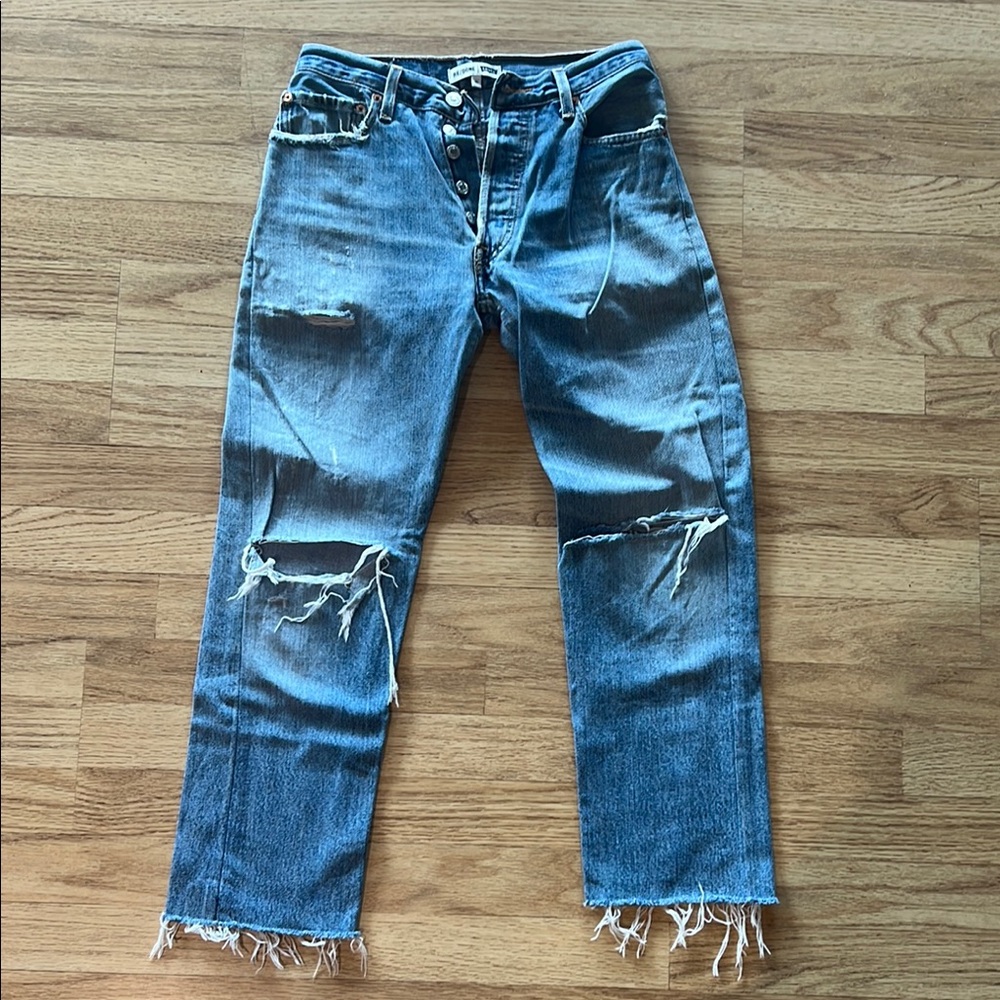 Re/Done Levi’s - stove pipe. Button fly. Distressed Blue Denim Jeans